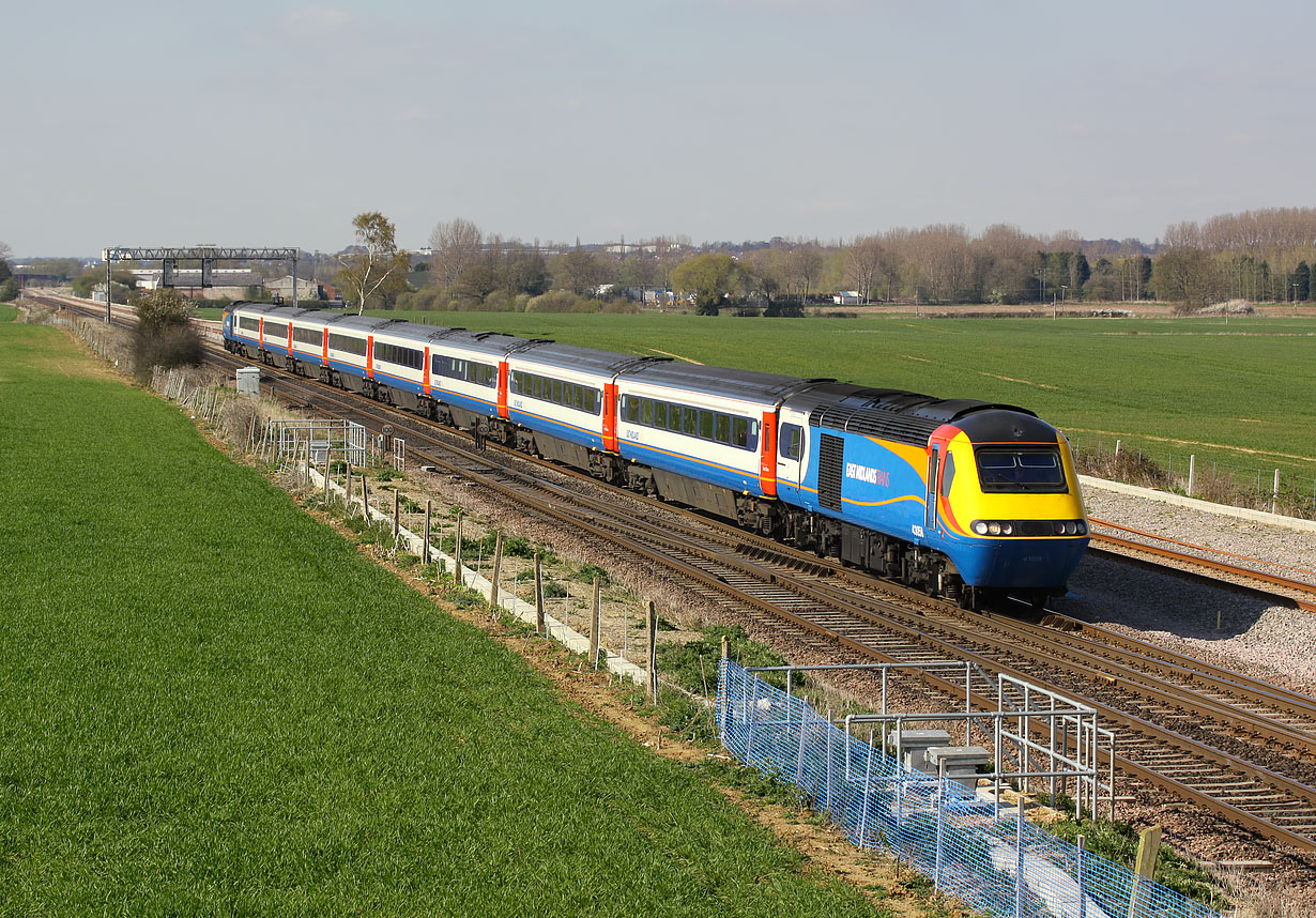 43060 races past Barrow Upon Soar on 12 September 2009 with the 1B43 12:28 Nottingham to St Pancras East Midlands Trains service. The complete train is in the East Midland's second attempt at a corporate colour scheme. Although not generally liked, I prefer it to both the original turquoise colour scheme, and the later blue, orange and red version, despite the odd graphics.